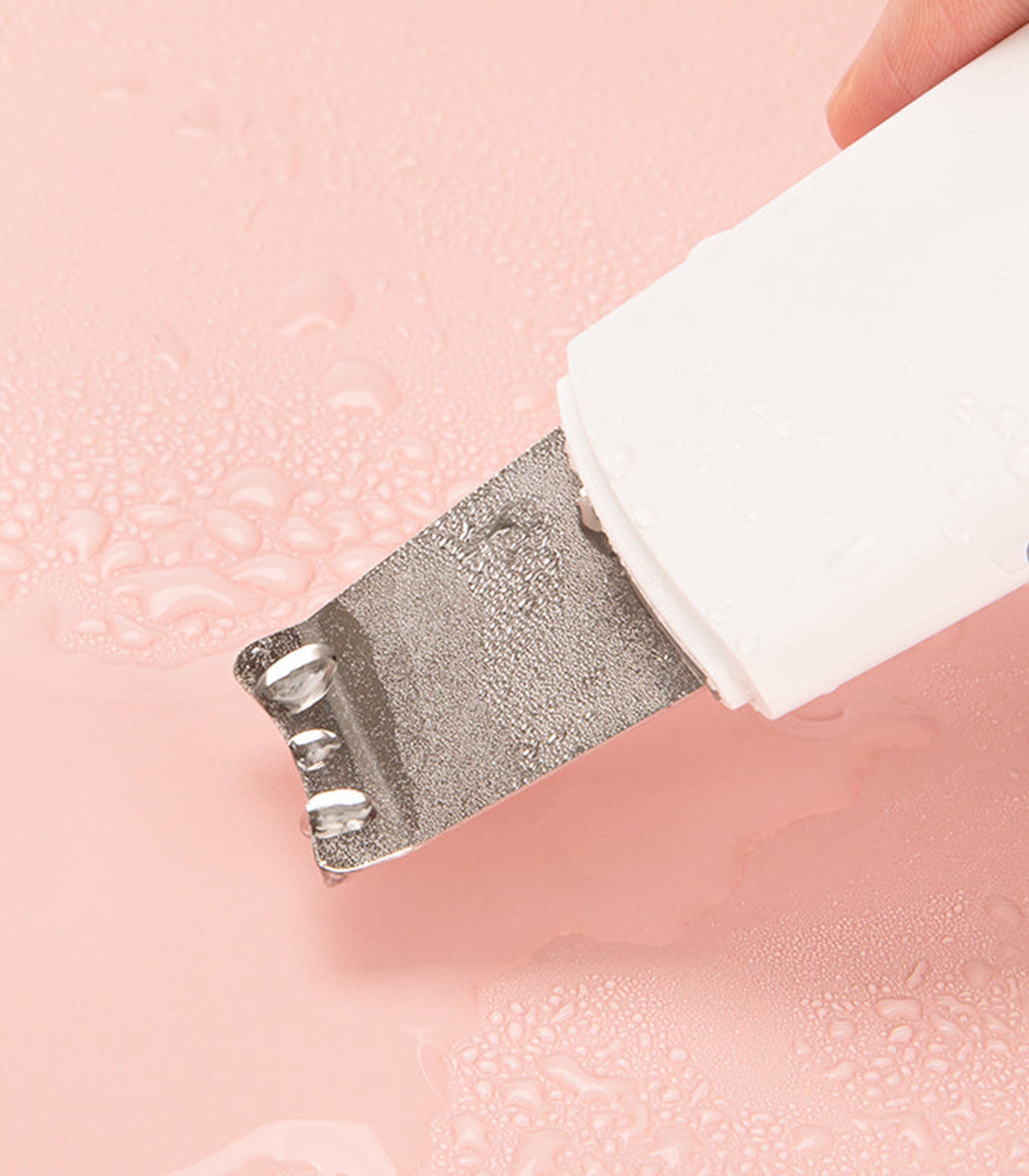 Ultraääninen ioni-ihohoitolaite kotikäyttöön kasvojen puhdistukseen